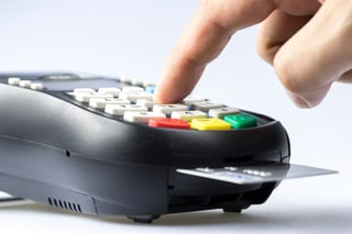 A-credit-card-machine-asking-for-a-password-for-payment-000059390580_Medium-1.jpg
