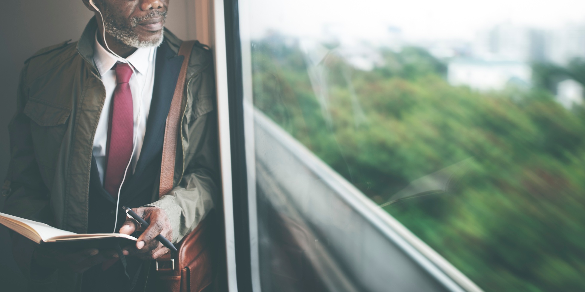 Businessman-Travel-Passenger-African-Descent-Concept-000091548381_Medium.jpg