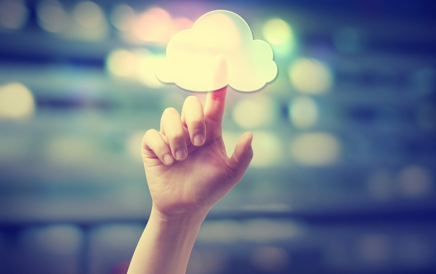 Hand-pressing-a-cloud-computing-icon-000071881237_Small-1.jpg