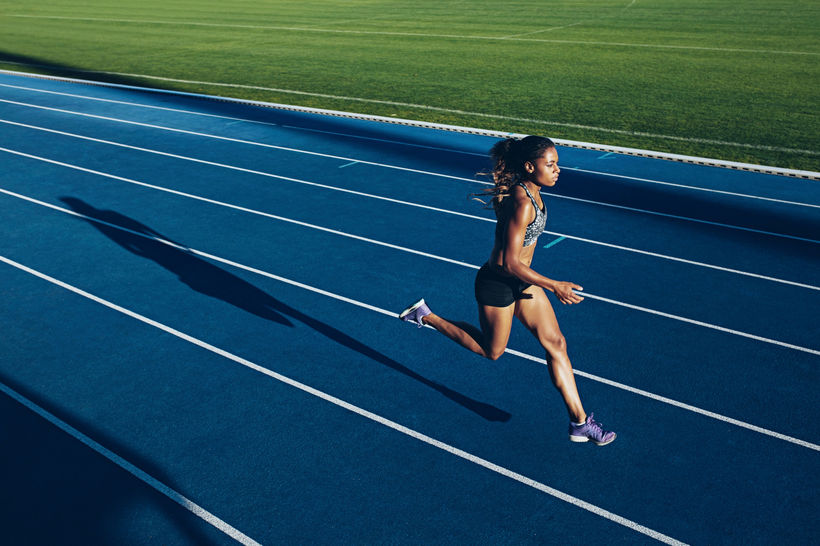 African-woman-running-on-racetrack-000074623983_Large.jpg